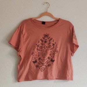 Short Sleeved Whimsigoth Peach Crop Top with Black Witchy Decal from Vibe N'